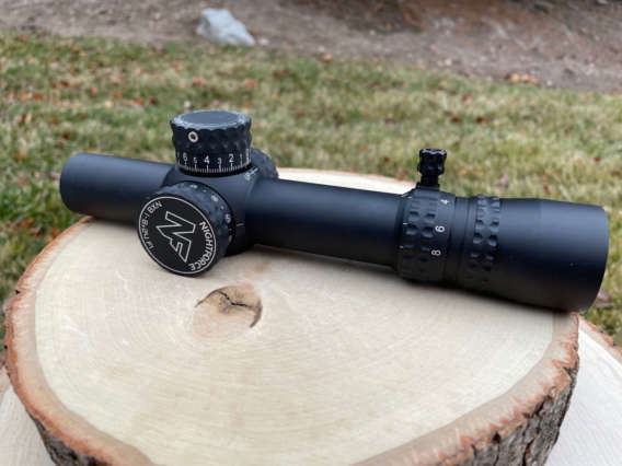 Nightforce NX8 1-8×24. Model C598. ZeroStop. Illuminated FC-Mil Reticle. Includes Nightforce box, manual, Power Throw Lever, and cleaning fob / cleaning cloth. First Focal Plane. 30mm Tube